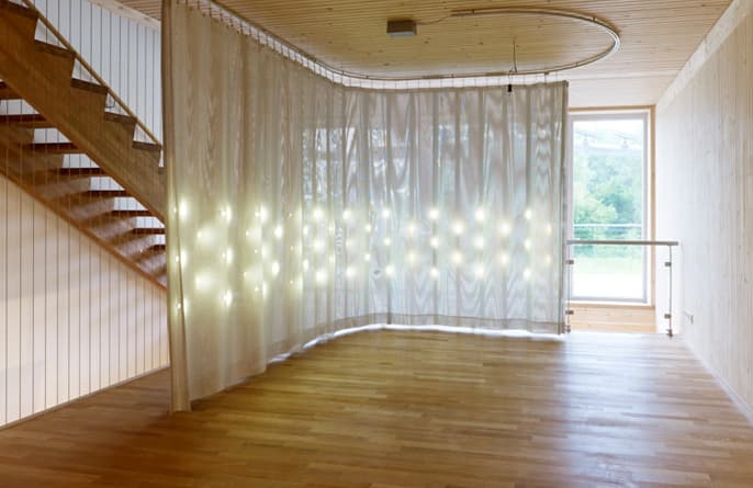 Middle level: the curtain drawn toward the stair.