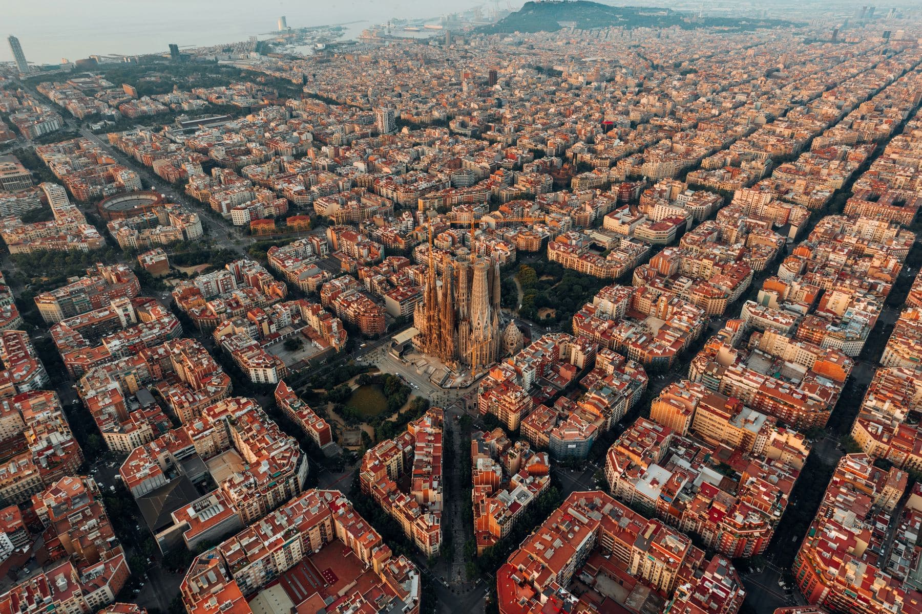 Aerial view of the Eixample grid in Barcelona, with the Sagrada Familia at its center